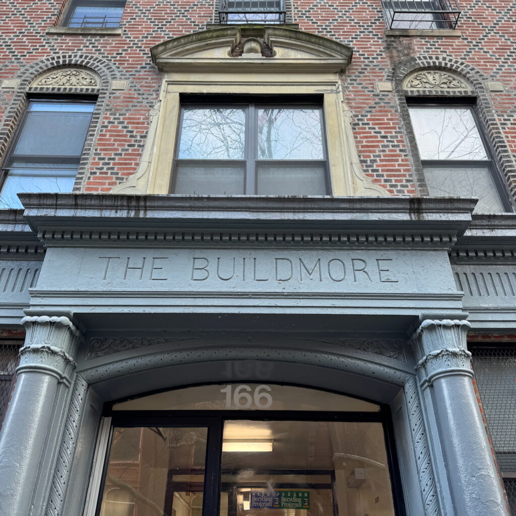 Entrance pediment at the Buildmore Apartments, 166 South 9th Street, Brooklyn.